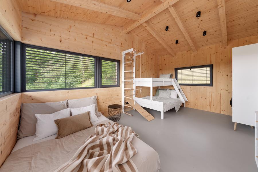 The family bedroom with a double bed and a bunk bed
